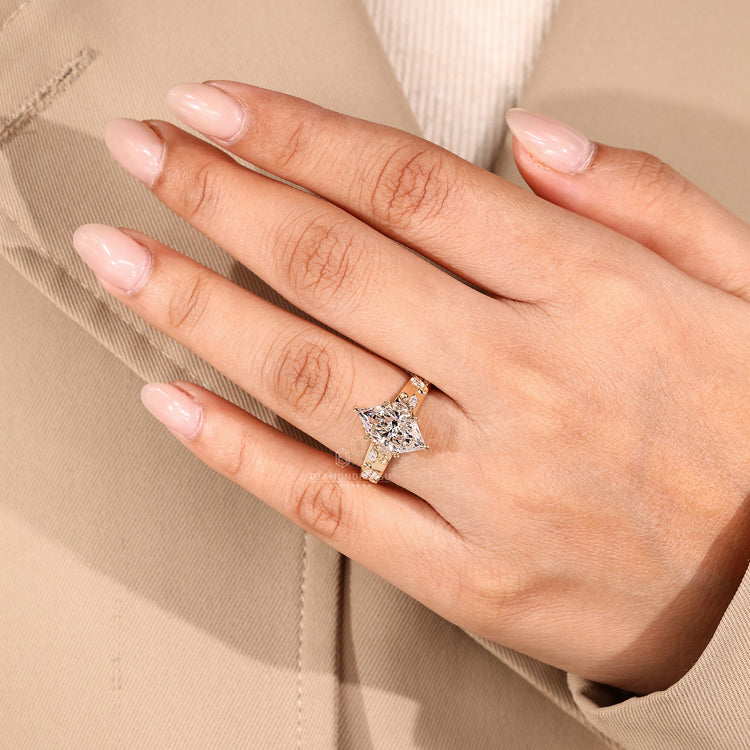 Diamondrensu engagement ring designed with a cathedral setting in yellow gold.
