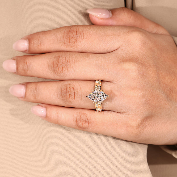Custom engagement ring blending art deco design with organic leaf details.
