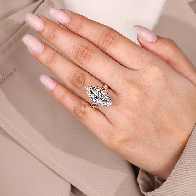 Lab grown marquise diamond engagement ring.
