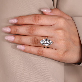 Handmade ring with hidden halo diamonds.
