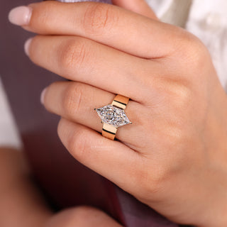 Solitaire diamond ring with six claw prong setting.
