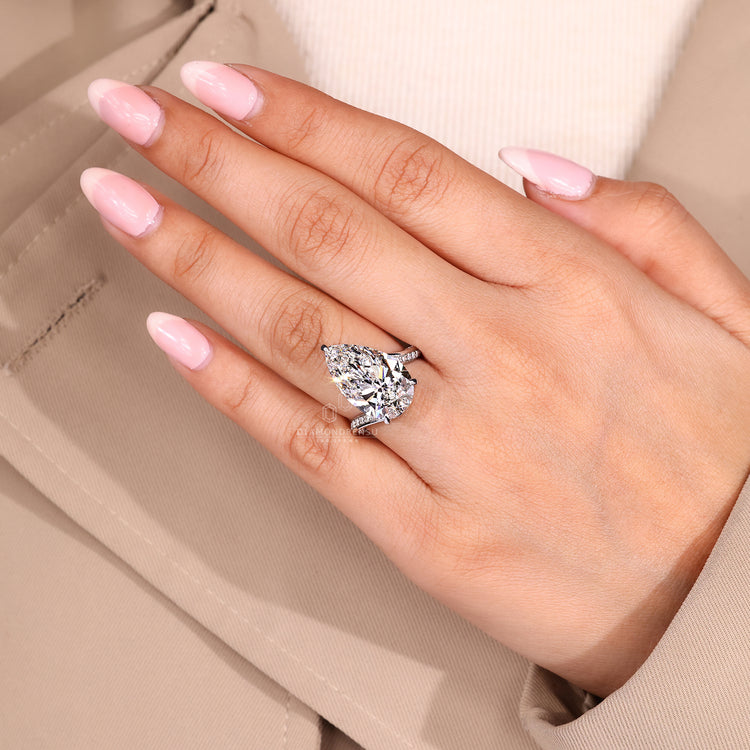 Handmade jewelry pear diamond ring.
