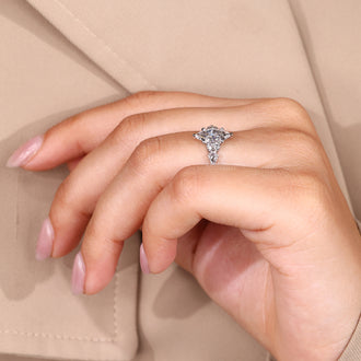 Tapered shank marquise diamond engagement ring.
