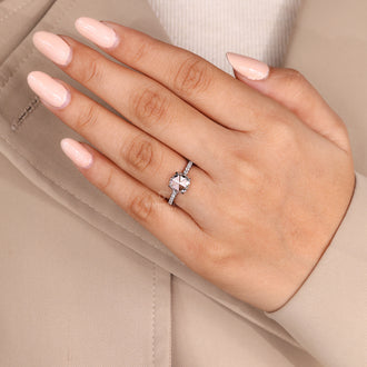 Open gallery ring showcasing rose cut diamond in white gold setting.
