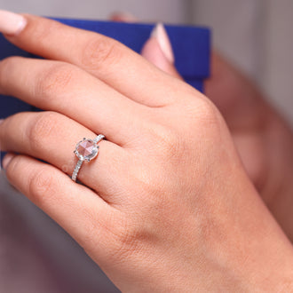 Pave setting ring with rose cut diamond and round cut pave band.
