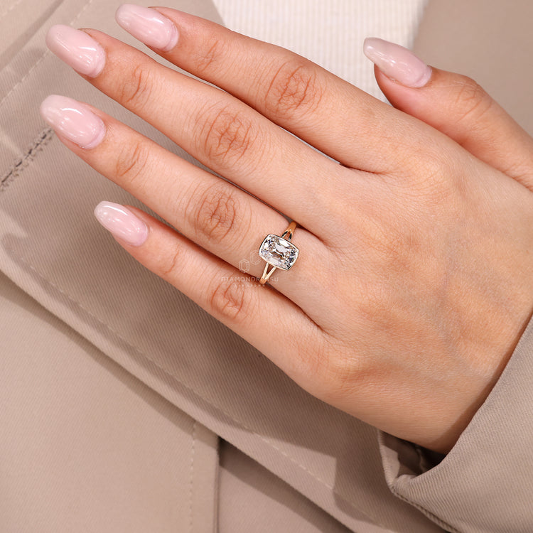 Split shank band ring featuring cushion old mine cut diamond.