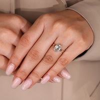 Lab grown diamond ring with split shank and bezel setting.