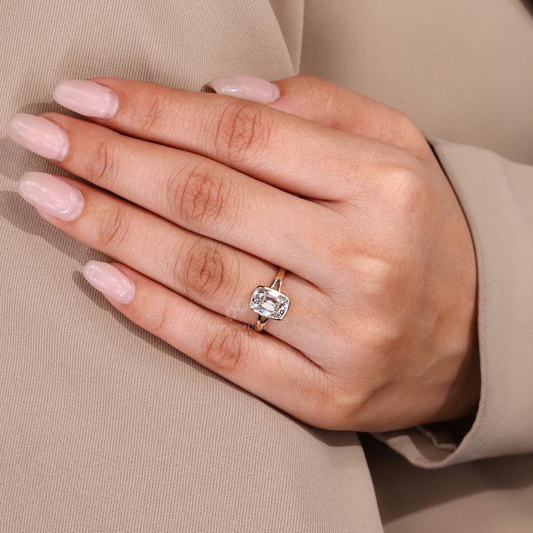 IGI certified handmade bezel set diamond ring with split shank.