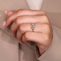 Elegant diamond ring with cushion old mine center and cathedral setting.