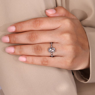 IGI certified handmade ring featuring oval rose cut diamond and double prong.
