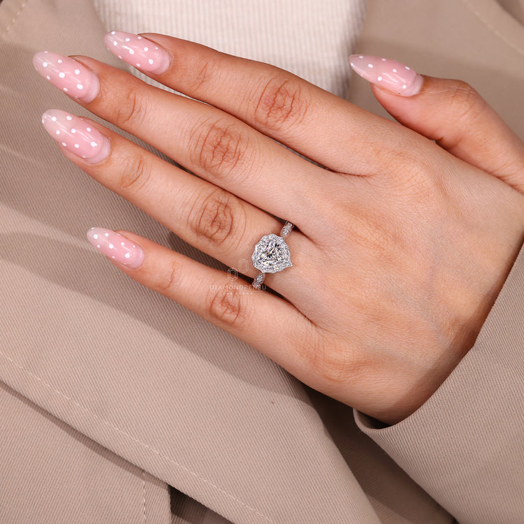 Heart Shape Diamond Ring With Cathedral Setting And Pave Band.