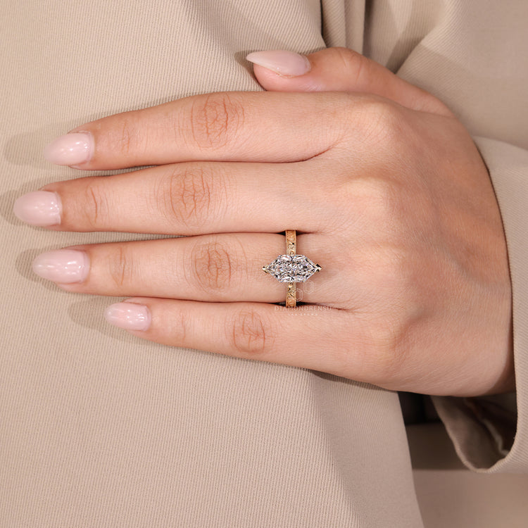 Diamondrensu engagement ring featuring a Dutch marquise cut in yellow gold.
