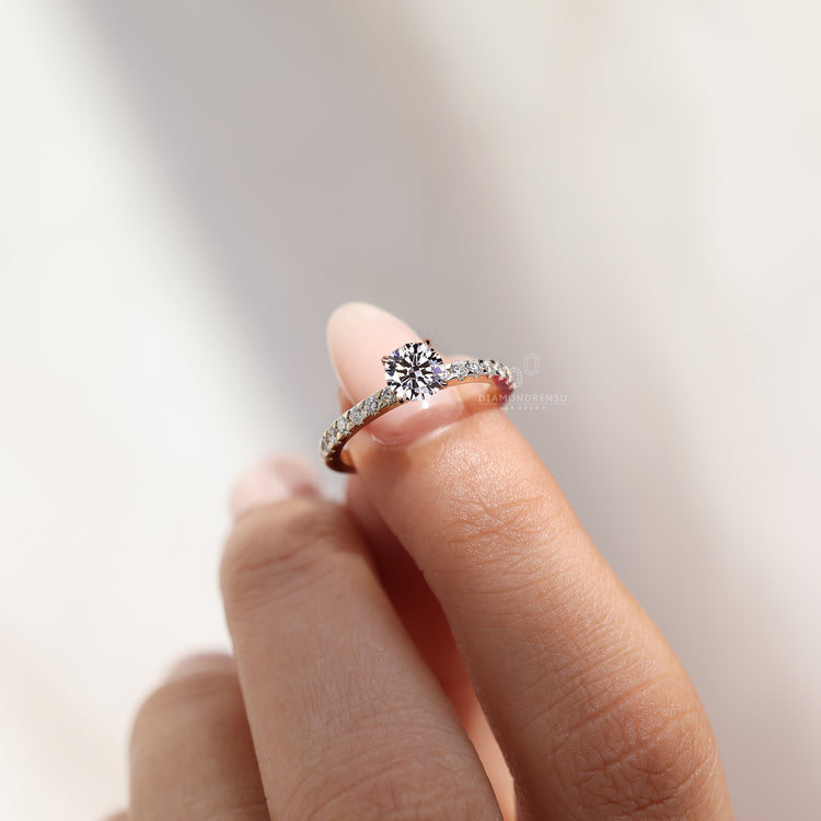 Yellow gold round cut diamond engagement ring by Diamondrensu.
