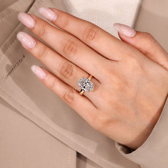Lab grown oval diamond engagement ring.
