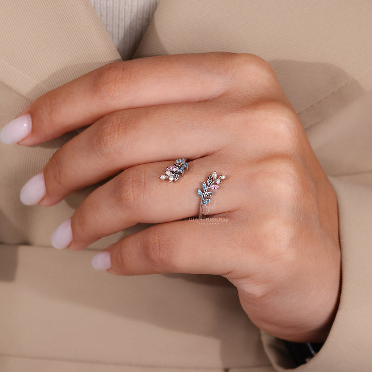 White gold band with diamondrensu gemstone wedding band style.
