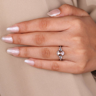 IGI certified handmade ring with oval rose cut diamond and cluster design.
