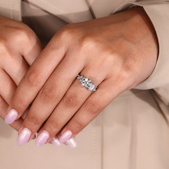 Unique diamondrensu engagement ring in white gold with custom cut stones
