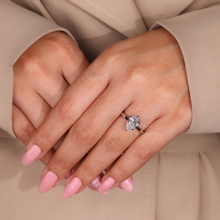 Handmade jewelry pear diamond engagement ring.
