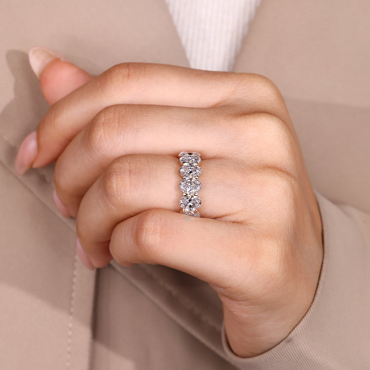 Stackable wedding band with oval lab grown diamonds.