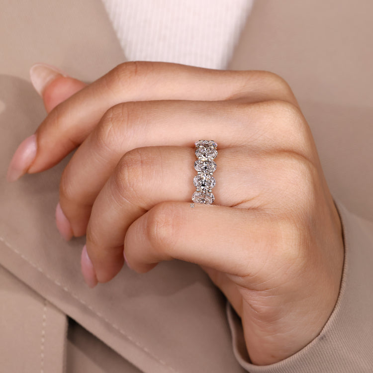 Basket setting wedding band with oval lab grown diamonds.