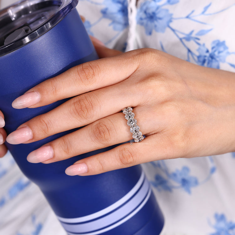 Lab grown oval diamond wedding band with basket setting.