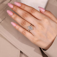 Dutch Marquise Engagement Ring With Round Cut Halo Setting.