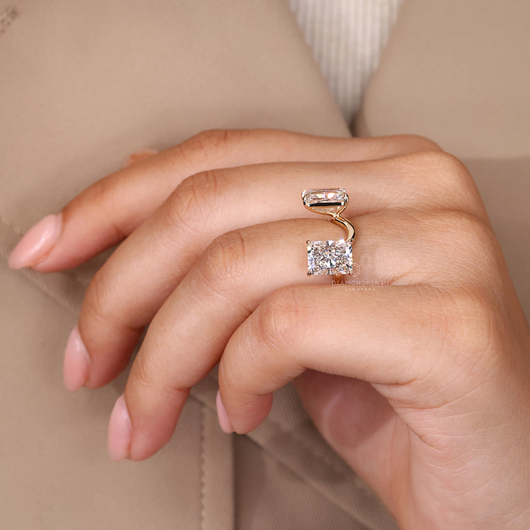 IGI certified two stone radiant cut engagement ring in yellow gold.
