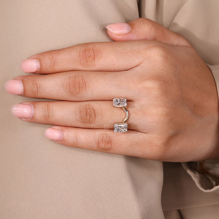Two stone ring with radiant cut diamonds and handmade craftsmanship.
