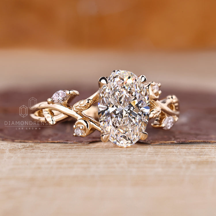 Diamondrensu engagement ring with oval cluster and side stones
