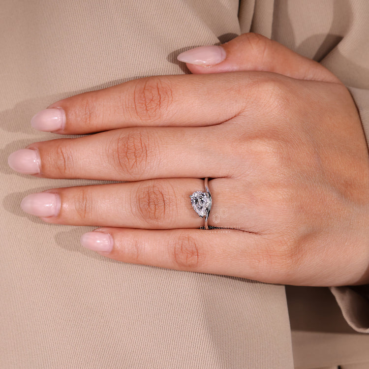 East west pear diamond solitaire ring crafted with lab grown diamond.