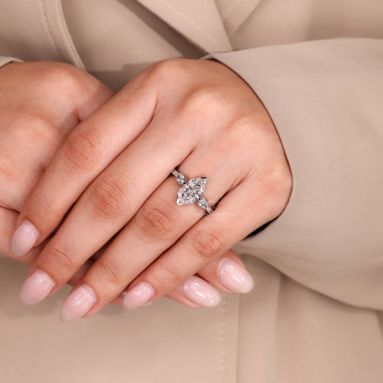 Lab grown diamond Dutch marquise ring with pear side accents.
