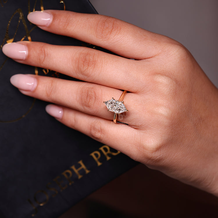 Bridge accent engagement ring crafted with cathedral setting details.
