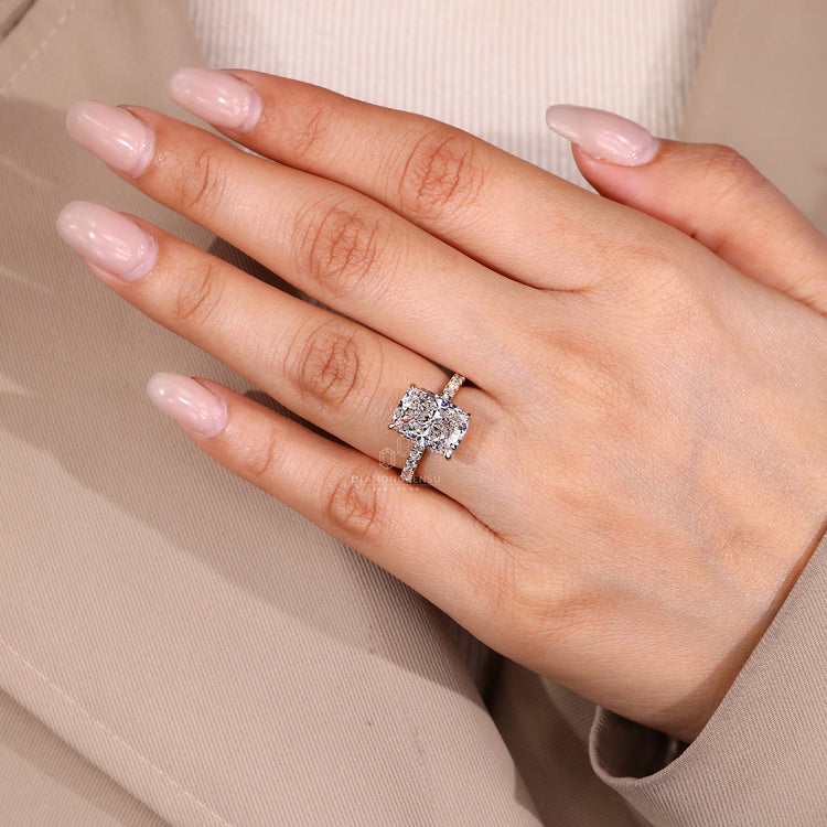 Handmade jewelry featuring elongated cushion and pave setting ring.
