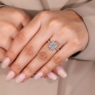 Diamondrensu engagement ring with elongated cushion diamond.
