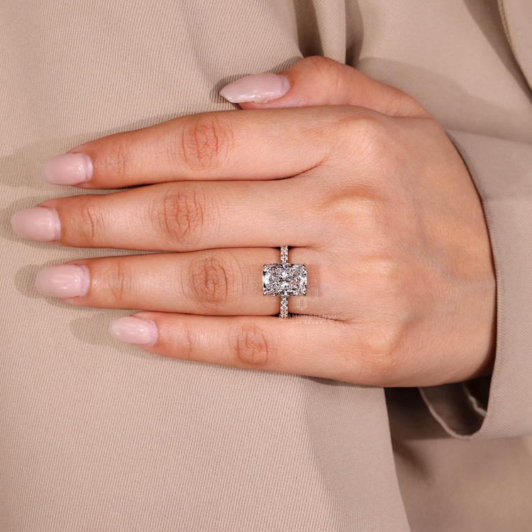Round cut pave band ring in elongated cushion diamond handmade ring.
