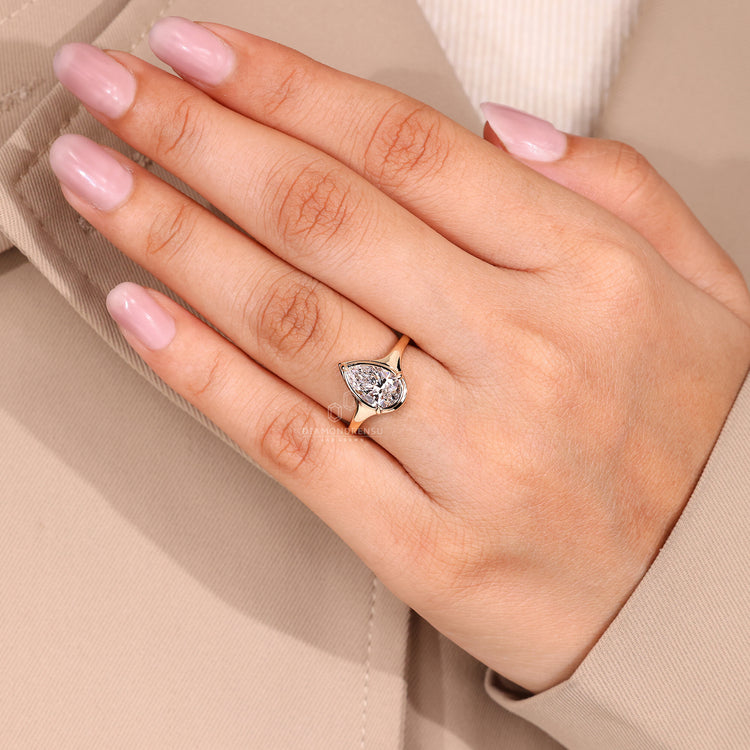 IGI Certified pear shaped solitaire engagement ring.
