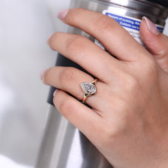 Solitaire Setting Ring with pear cut diamond design.
