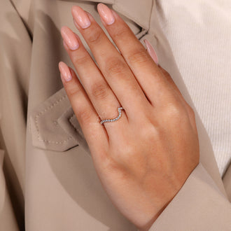 An Lab Diamond wedding band in a wave pattern
