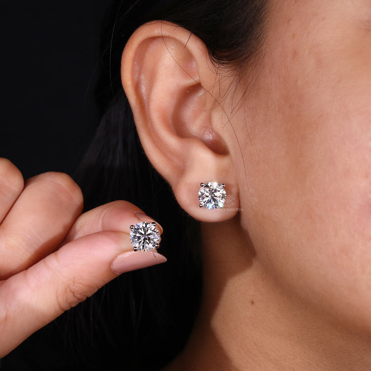 White gold diamond earrings with handmade studs earrings for luxury style.