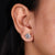 Radiant push back earrings with flawless round diamond stud earrings.