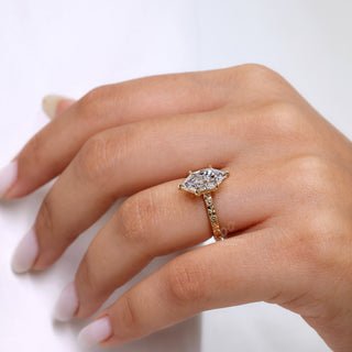 6 claw prong setting engagement ring with a marquise diamond, ensuring a secure and stylish hold.
