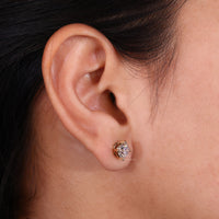 Stunning diamond earrings round designed for sophisticated elegance.
