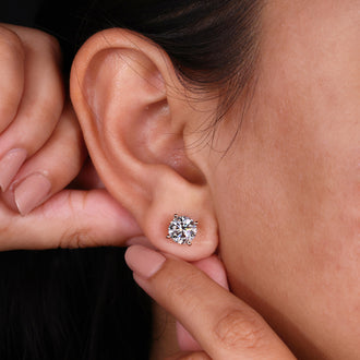 Stud earrings for women with a screw back diamond earrings feature.