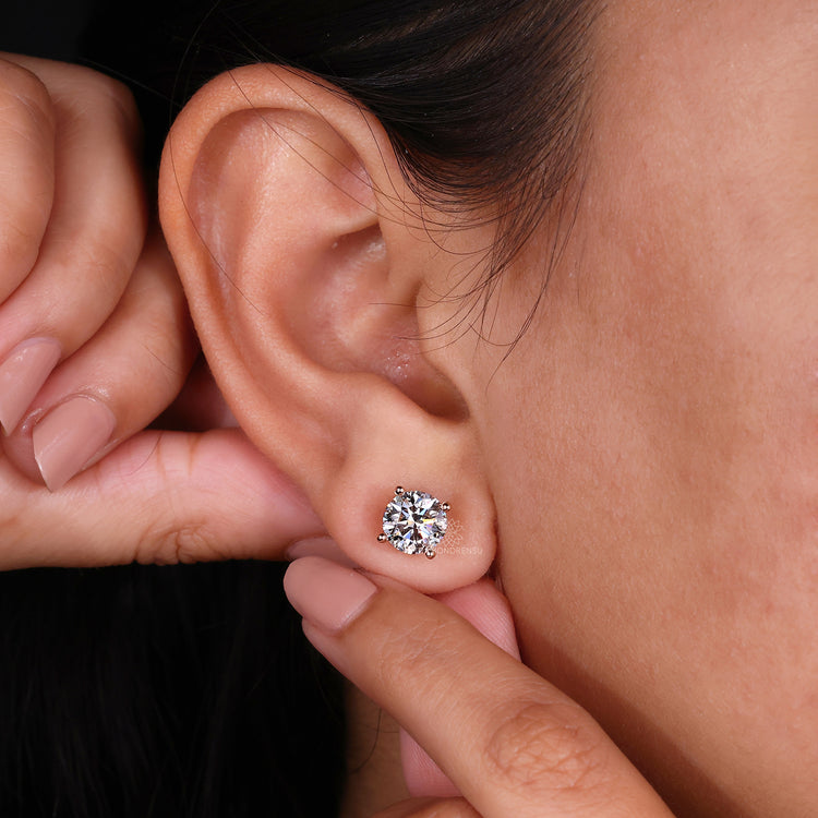 Stud earrings for women with a screw back diamond earrings feature.