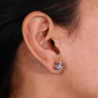 Round diamond earrings studs with secure screw back earrings for comfort.