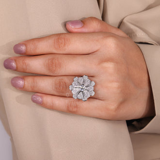 Vintage diamond ring showcasing round diamonds and handmade craftsmanship.
