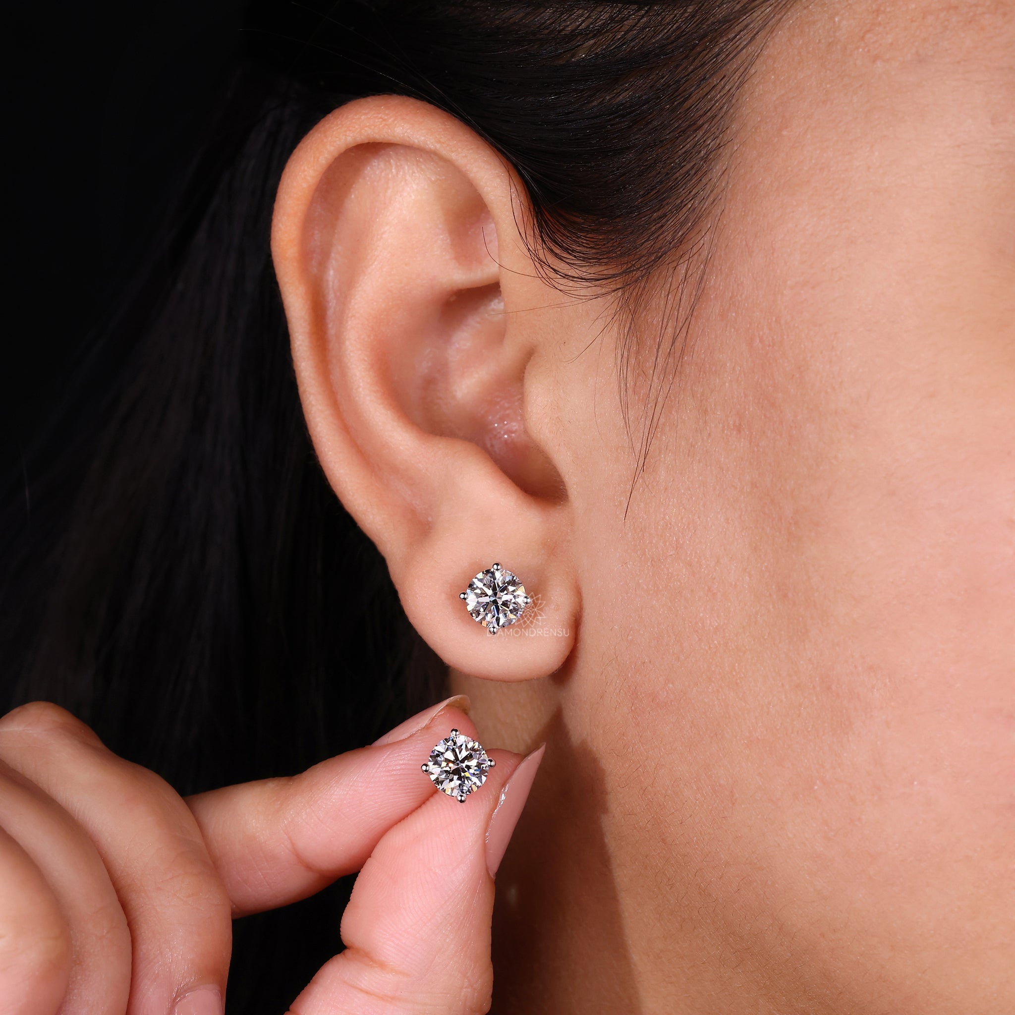 Round stud earrings featuring handmade jewelry craftsmanship for unique appeal.
