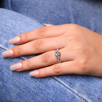 Twisted pave engagement ring in handmade jewelry design.
