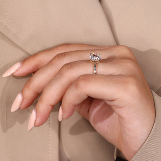 Four prong setting round old European cut ring.
