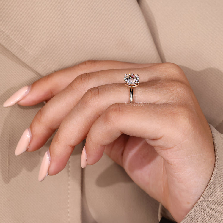 Four prong setting round old European cut ring.
